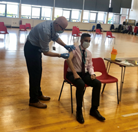 Inverclyde Council chief executive Aubrey Fawcett receiving a flu jab at Port Glasgow Town Hall